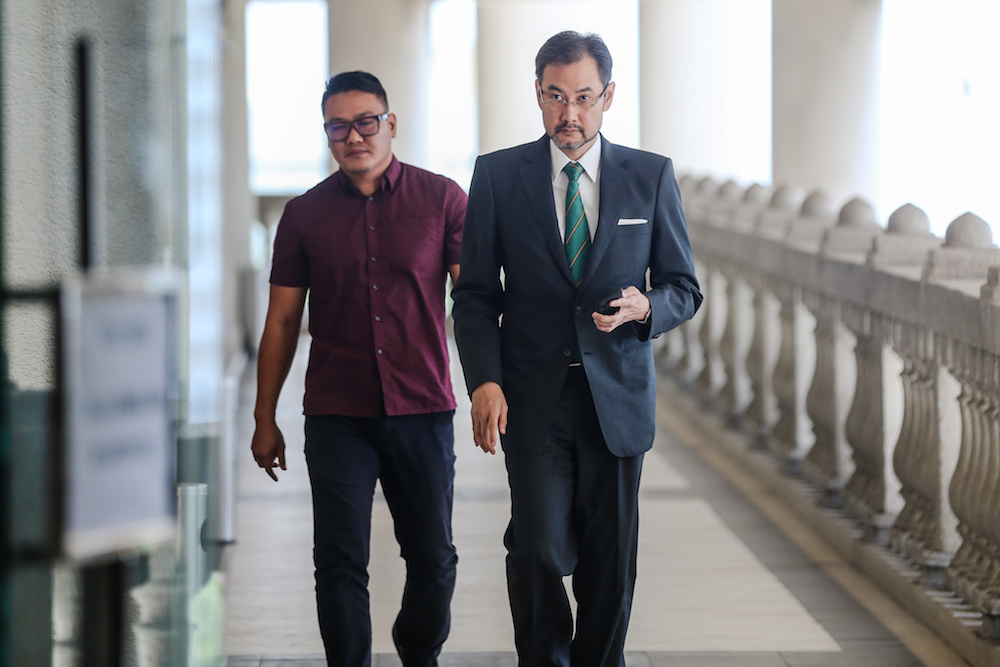 Former 1MDB chief executive officer Datuk Shahrol Azral Ibrahim Halmi arrives at the Kuala Lumpur High Courts Complex October 30, 2019. u00e2u20acu201d Picture by Yusof Mat Isa