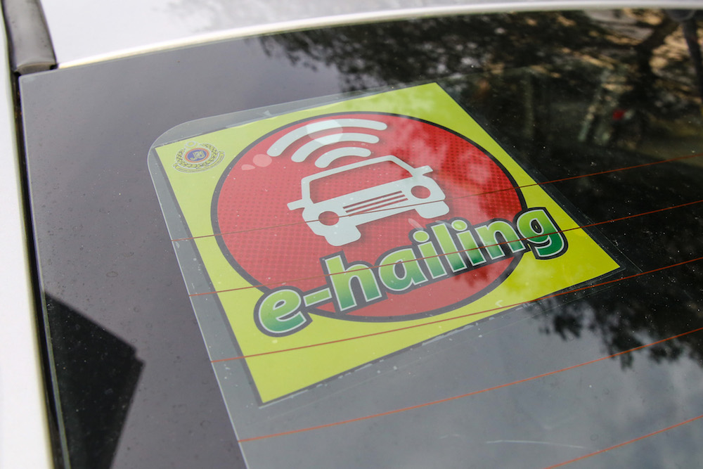 An e-hailing sticker is seen on a car windscreen in Kuala Lumpur October 31, 2019. u00e2u20acu201d Picture by Yusof Mat Isa