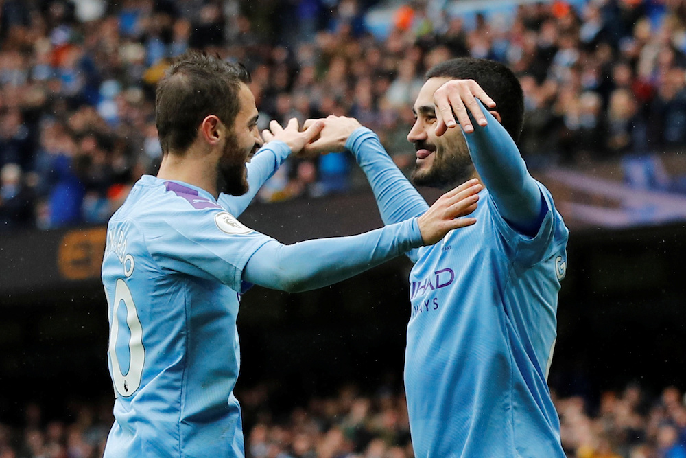 Manchester City's Ilkay Gundogan celebrates scoring their third goal with Bernardo Silva in Manchester, October 26, 2019. u00e2u20acu201d Reuters pic 