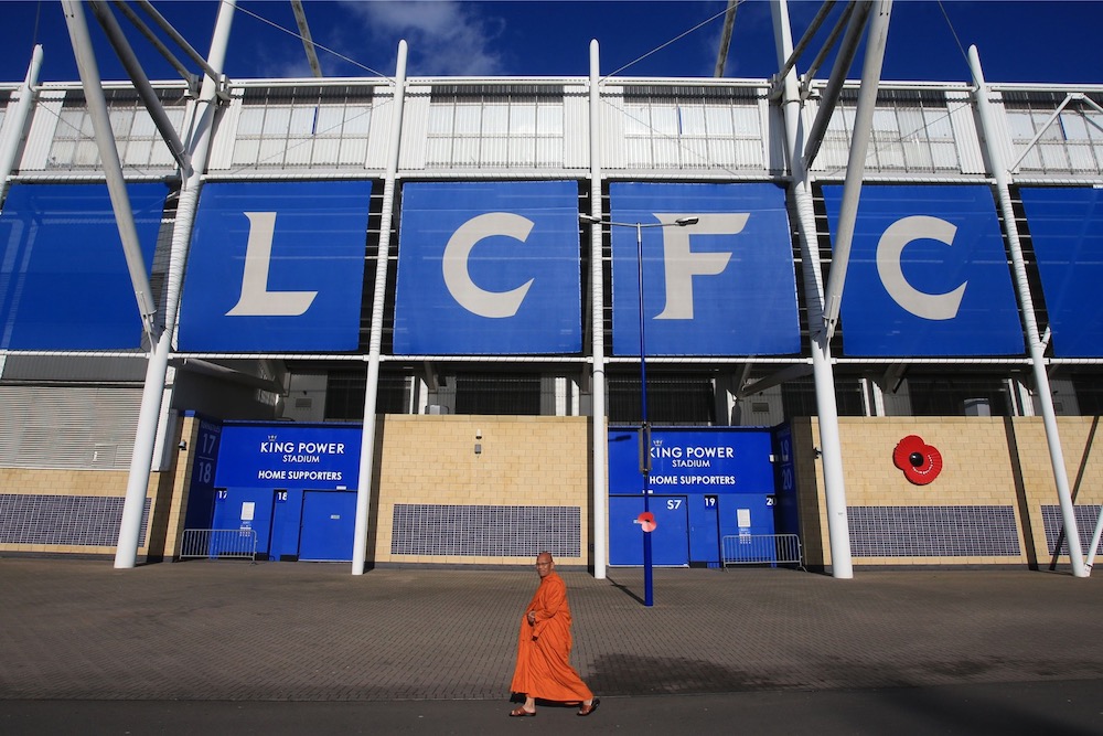 A Buddhist monk walks past the stadium after attending the opening of a memorial garden, honouring the five people who died in a helicopter crash on the site, beside the King Power Stadium in Leicester October 27, 2019. u00e2u20acu201d AFP pic