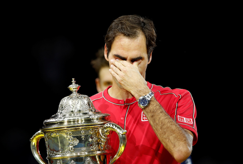Switzerland's Roger Federer celebrates with the trophy after winning the final against Australia's Alex de Minaur, Basel October 27, 2019. u00e2u20acu201d Reuters pic 