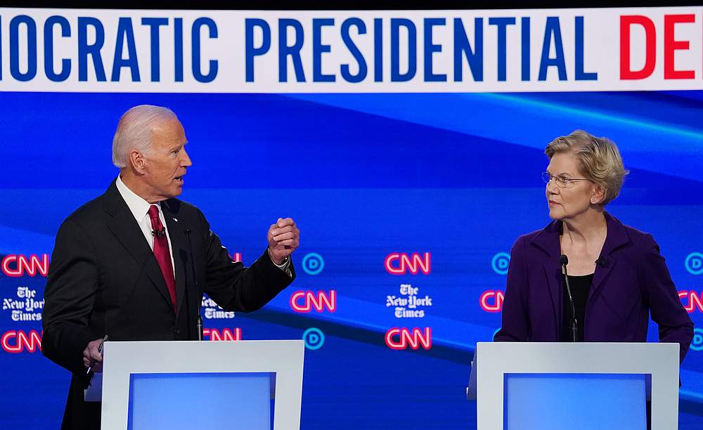 Democratic presidential candidate Joe Biden speaks as Senator Elizabeth Warren looks on during the fourth US Democratic presidential candidates 2020 election debate at Otterbein University in Westerville, Ohio October 15, 2019. u00e2u20acu201d Reuters pic 