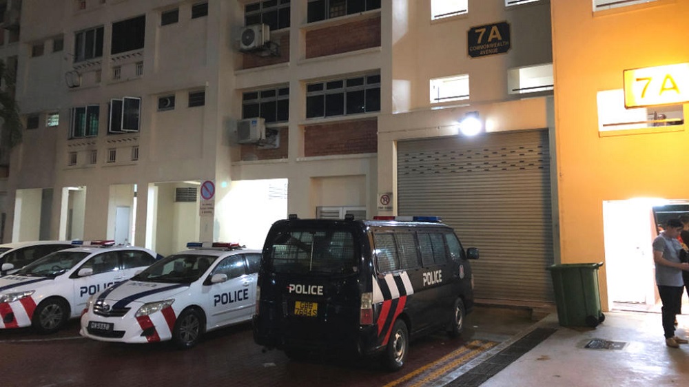 Police vehicles were seen near Block 7A Commonwealth Avenue, where two women were found dead. u00e2u20acu201d TODAY pic