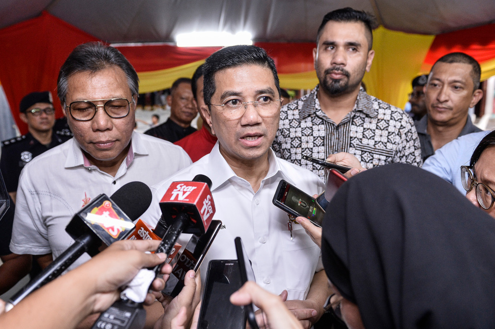 Economic Affairs Minister Datuk Seri Mohamed Azmin Ali speaks to reporters at Sekolah Menengah Telok Gadong, Klang October 12,2019. u00e2u20acu201d Picture by Miera Zulyana