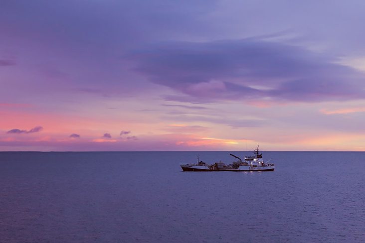 Dawn breaks as the ferry carries passengers from Punta Arenas to Porvenir.