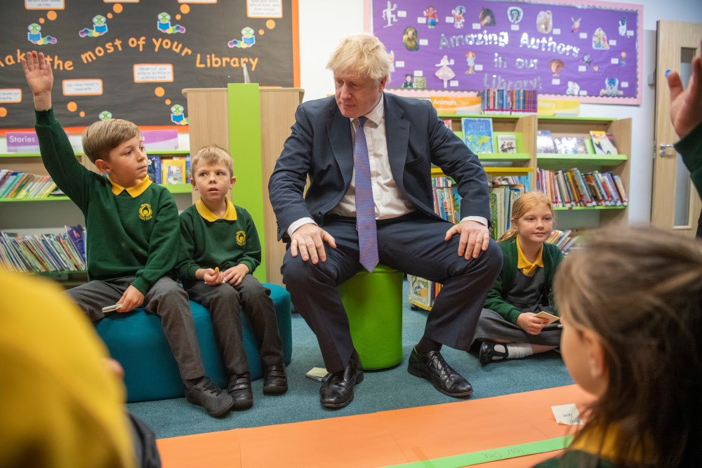Britainu00e2u20acu2122s Prime Minister Boris Johnson speaks to pupils as he visits Middleton Primary School in Milton Keynes, southern England October 25, 2019. u00e2u20acu201d AFP pic 