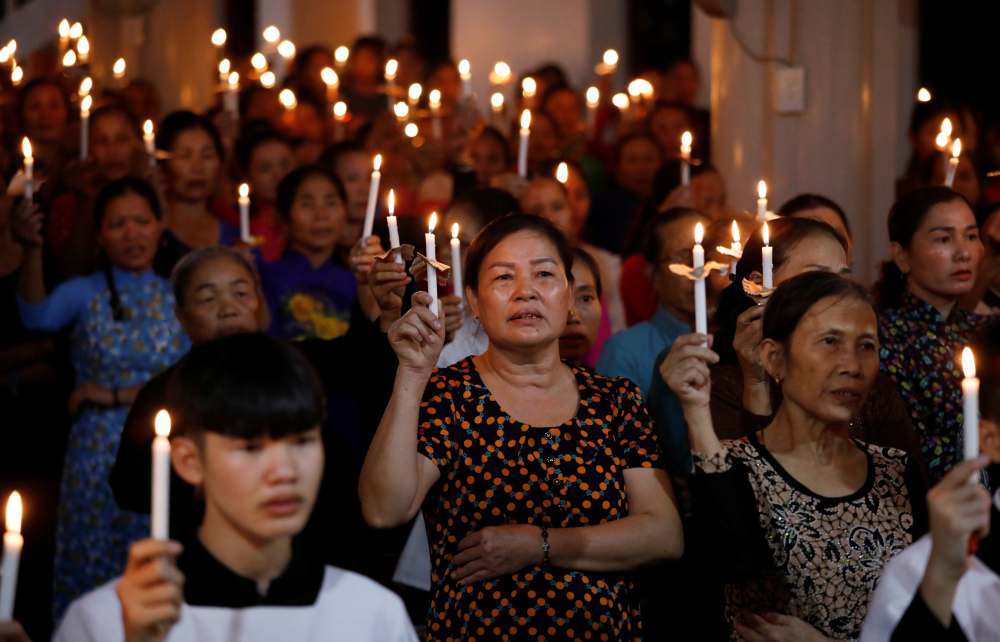 Catholics attend a mass prayer for 39 people found dead in the back of a truck near London, UK at My Khanh parish in Nghe An province, Vietnam October 26, 2019. u00e2u20acu2022 Reuters pic