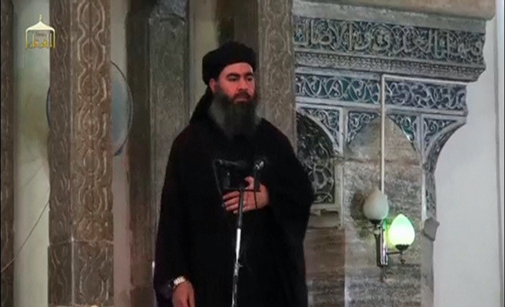 Still image of purported leader Islamic State Abu Bakr al-Baghdadi at a mosque in Mosul, according on July 5, 2014. u00e2u20acu201d Reuters pic