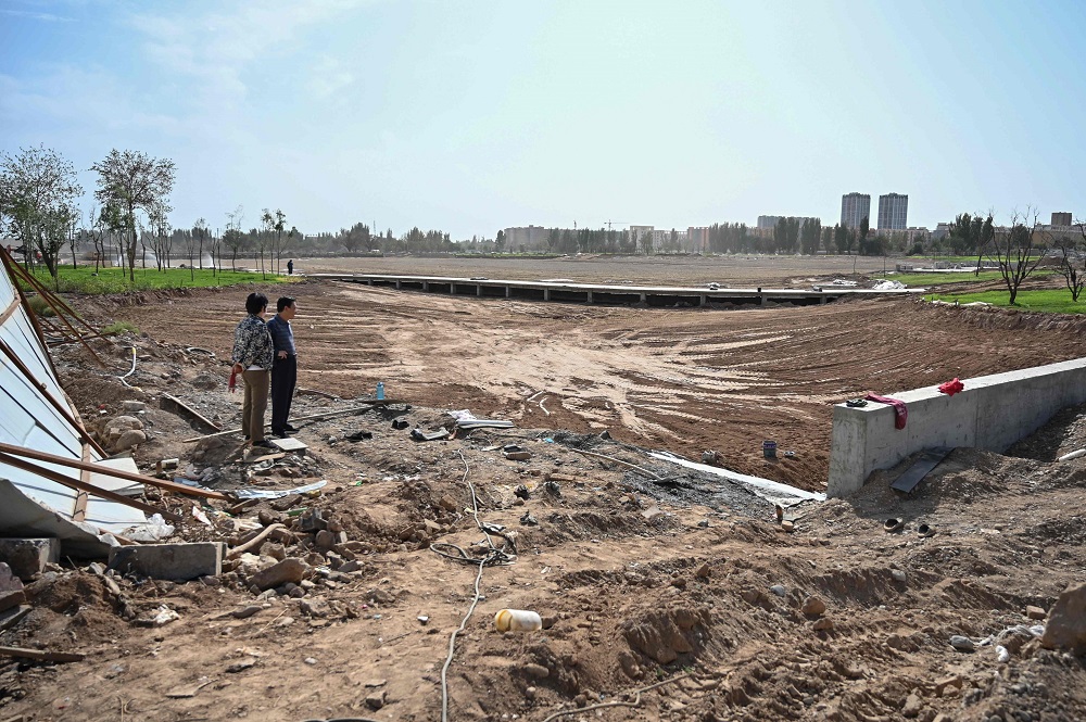 This photo taken on September 13, 2019 shows the works of a park in a place where before there was a Uighur cemetery in Kuche in the region of Xinjiang. u00e2u20acu2022 AFP pic 