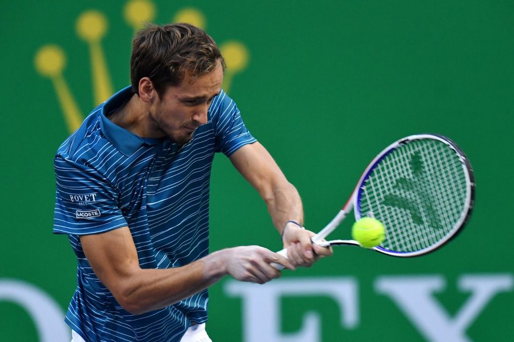 Daniil Medvedev of Russia hits a return against Stefanos Tsitsipas of Greece during their menu00e2u20acu2122s singles semi-final match at the Shanghai Masters tennis tournament in Shanghai on October 12, 2019. u00e2u20acu201d AFP pic