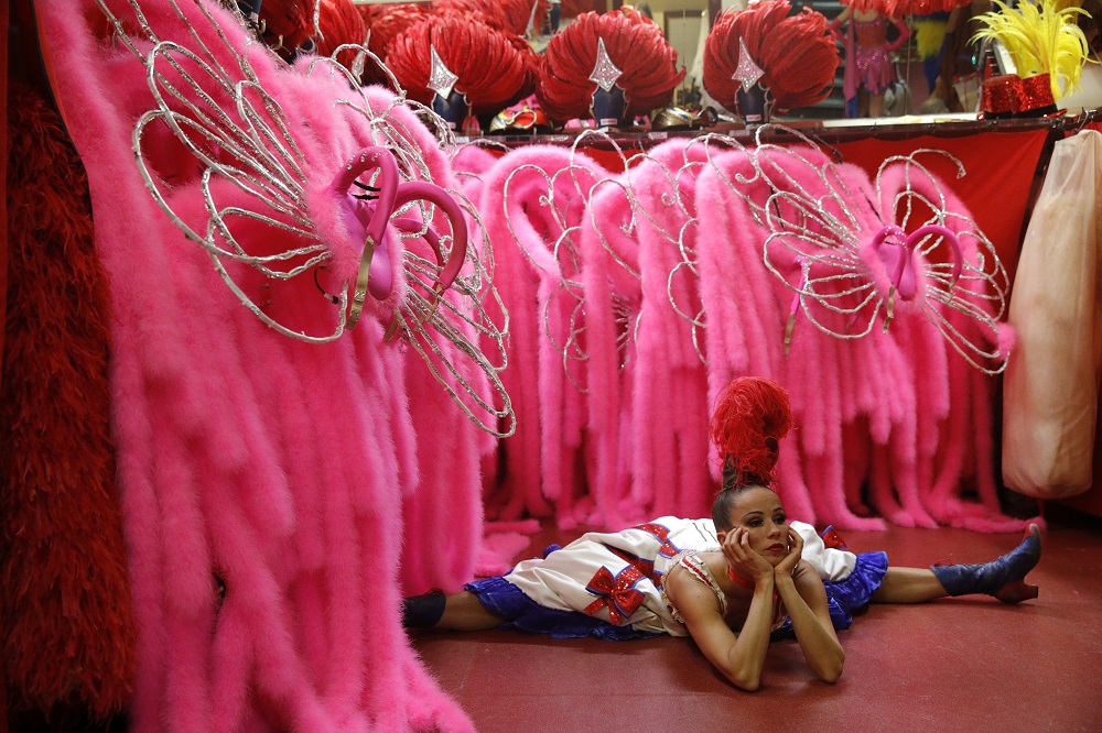 Axelle stretches as she warms up before performing the French Cancan at the u00e2u20acu02dcFeerieu00e2u20acu2122 review at the Moulin Rouge, in Paris September 19, 2019. u00e2u20acu201d Reuters pic