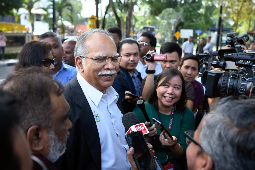 Penang Deputy Chief Minister II P. Ramasamy speaks to reporters after arriving at Bukit Aman October 21, 2019. u00e2u20acu201d Bernama pic