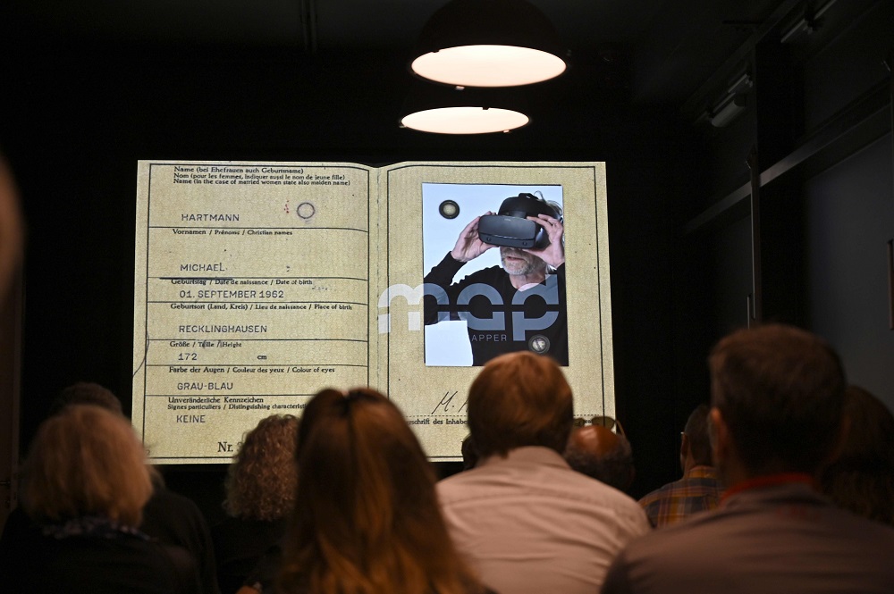 In this file photo taken on August 22, 2019, journalists attend a press tour at Timeride, a company offering Virtual Reality tours through a still-divided Berlin, on August 22, 2019 in Berlin. — AFP pic
