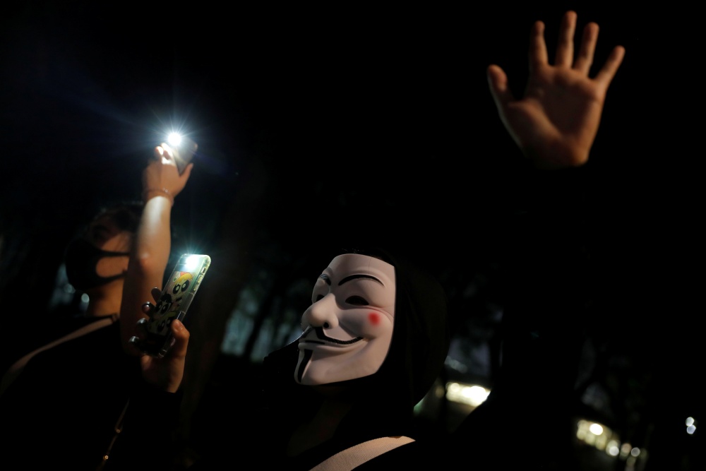 People form a human chain during a protest in Tai Po, Hong Kong October 11, 2019. u00e2u20acu2022 Reuters pic