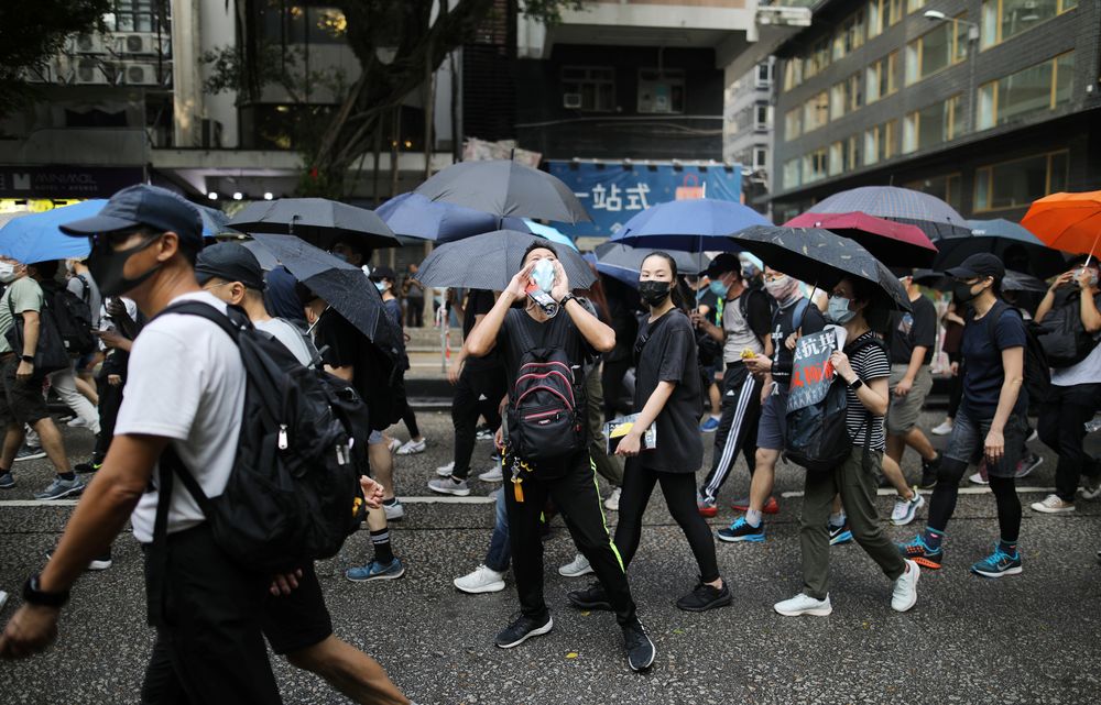 Anti-government demonstrators march in protest against the invocation of the emergency laws in Hong Kong, China, October 12, 2019. u00e2u20acu201d Reuters pic
