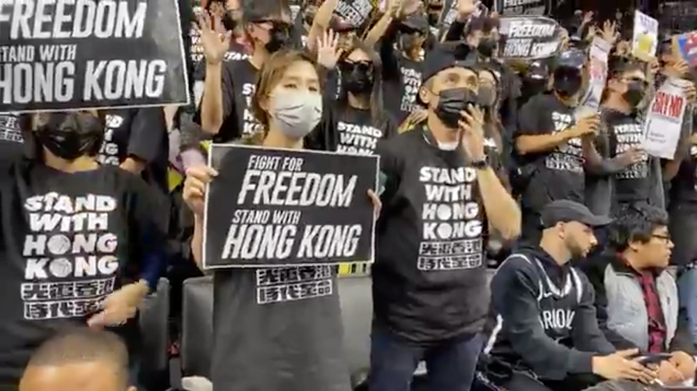 Pro-democracy protesters supporting Hong Kong are seen on the stands of Barclays Centre, New York, October 18, 2019 in this still image obtained from social media video on October 19, 2019. u00e2u20acu201d Reuters picnn