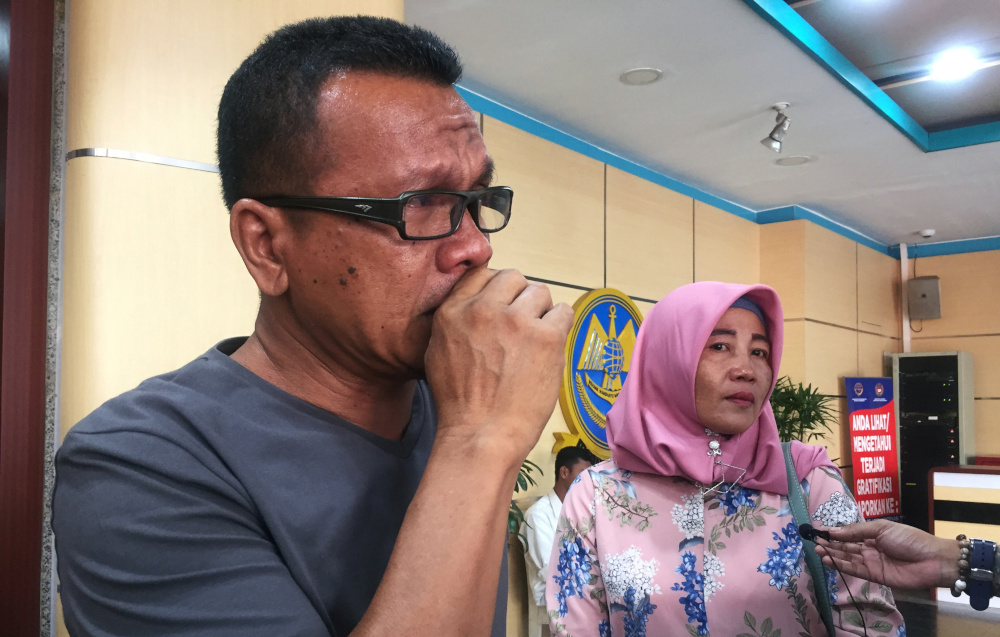 Epi Samsul Komar, 52, a relative of a victim of crashed Lion Air flight JT610 reacts as he speaks to reporters after Indonesian investigators told victimsu00e2u20acu2122 families mechanical and design issues contributed to the crash of the 737 MAX jet last year, in J