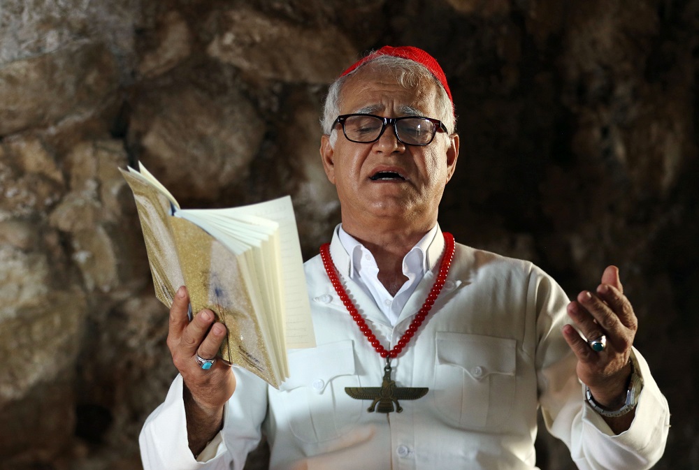 Iraqi Kurdish Asrawan Qadrok, the high priest of Zoroastrian religion, takes part in a ritual ceremony in an ancient temple of the Zoroastrian religion in the Iraqi Kurdish town of Darbandikhan, 70km south-east of Suleimaniya city October 11, 2019. u00e2u20acu201d AF