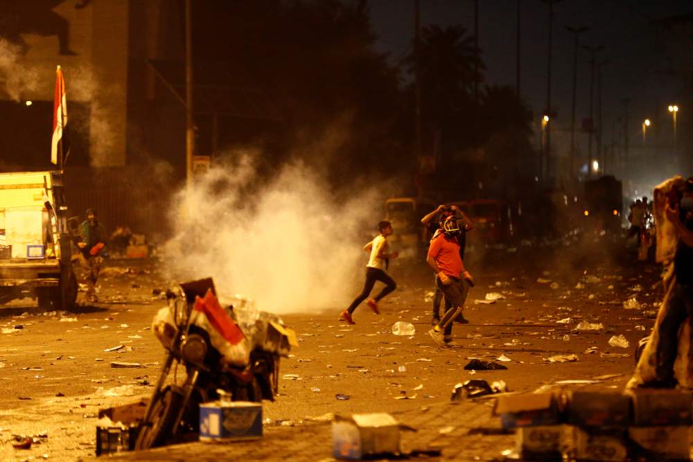A demonstrator wears a mask to protect himself from tear gas fired by Iraqi security forces during a protest over corruption, lack of jobs, and poor services, in Baghdad October 26, 2019. u00e2u20acu2022 Reuters pic 