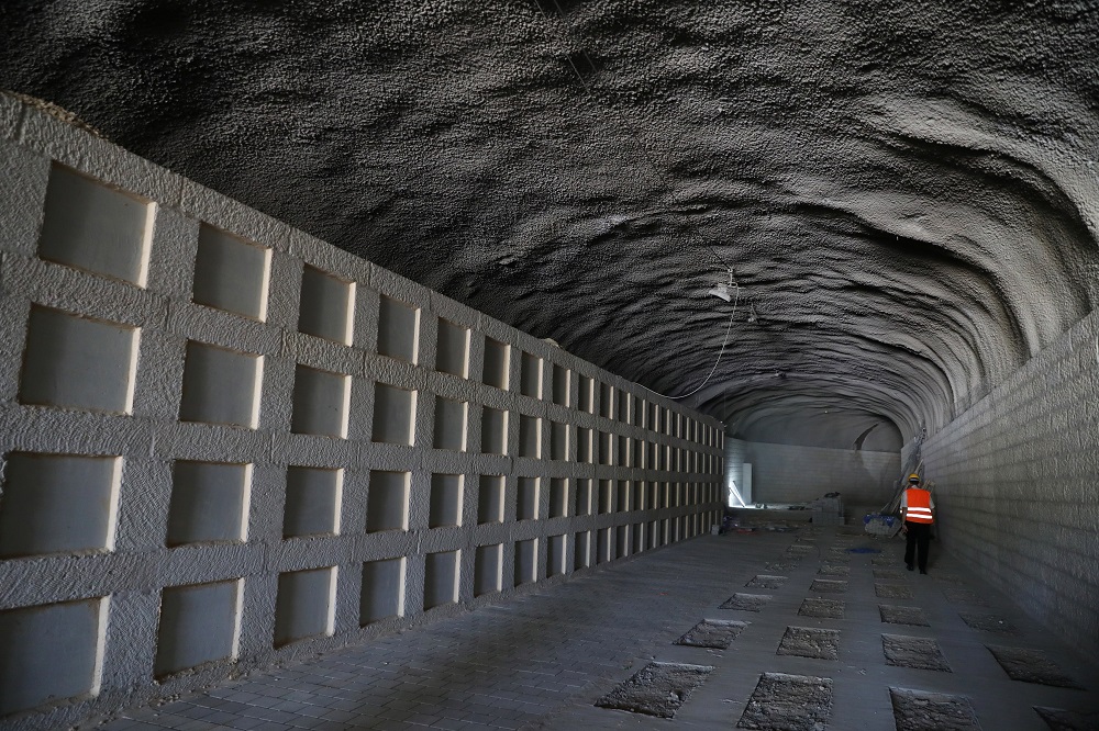 A labourer stands inside a section of a new underground cemetery, still under construction, located at Givat Shaul Cemetery in Jerusalem October 6, 2019. u00e2u20acu201d Reuters pic