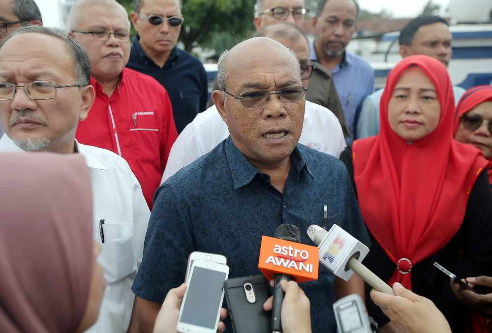Former Perak Umno secretary Datuk Khusairi Abdul Talib and Perak Umno leaders lodge a police report at the Sungai Senam Police Station in Ipoh October 15, 2019. u00e2u20acu2022 Picture by Farhan Najib