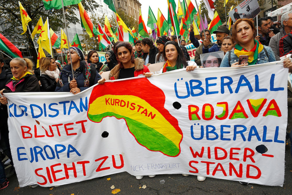 People carry a banner reading u00e2u20acu02dcKurdistan itu00e2u20acu2122s bleeding, Europe is just watchingu00e2u20acu2122 during a pro-Kurdish demonstration against Turkeyu00e2u20acu2122s military action in northeastern Syria in Frankfurt, Germany, October 19, 2019. u00e2u20acu201d Reuters picnnn