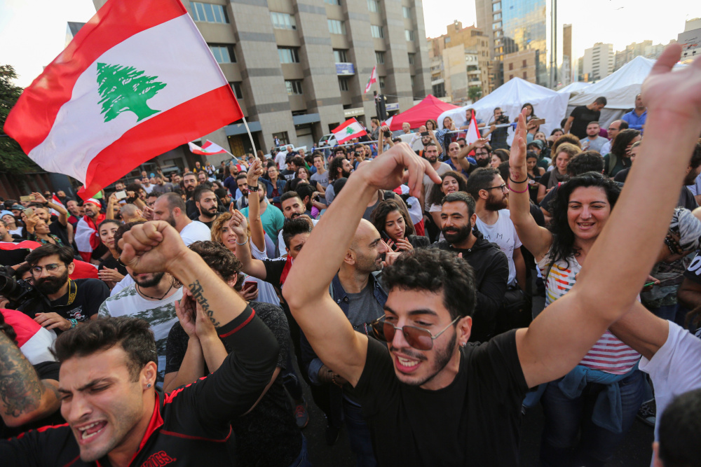 Protestors celebrate after Lebanonu00e2u20acu2122s Prime Minister Saad al-Hariri announced his resignation in Beirut, Lebanon October 29, 2019. u00e2u20acu201d Reuters pic 