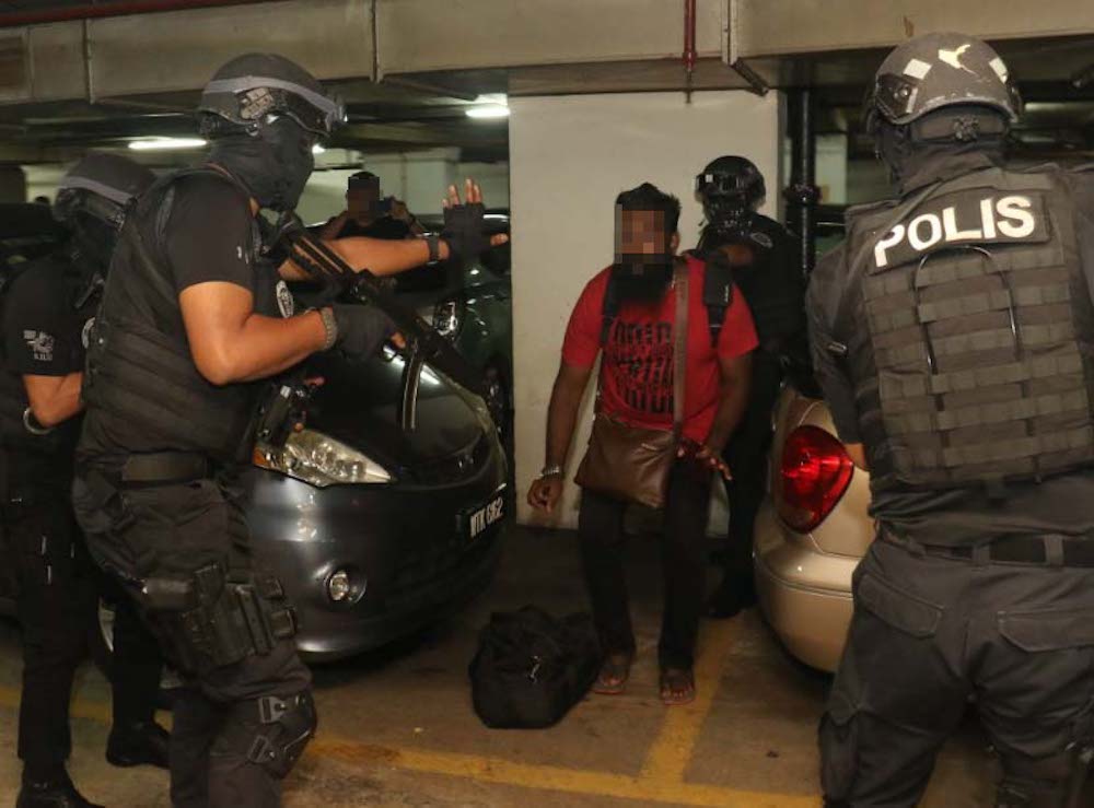 Counter-terrorism police carry out an operation against suspected Liberation Tigers of Tamil Eelam (LTTE) sympathisers in Segamat October 10, 2019. — Picture courtesy of PDRM