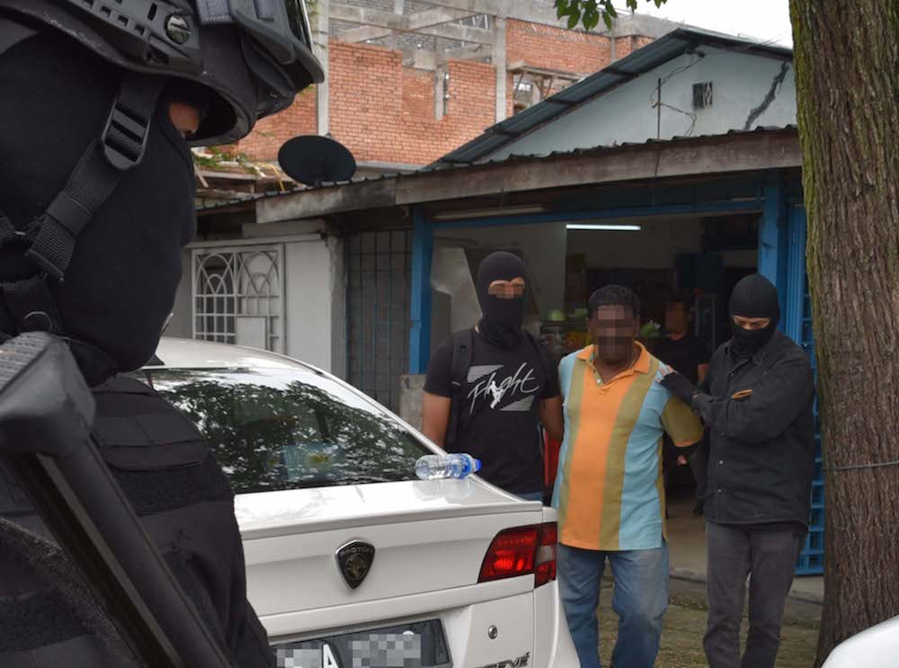 Counter-terrorism police carry out an operation against suspected Liberation Tigers of Tamil Eelam (LTTE) sympathisers in Sungai Buloh October 10, 2019. — Picture courtesy of PDRM