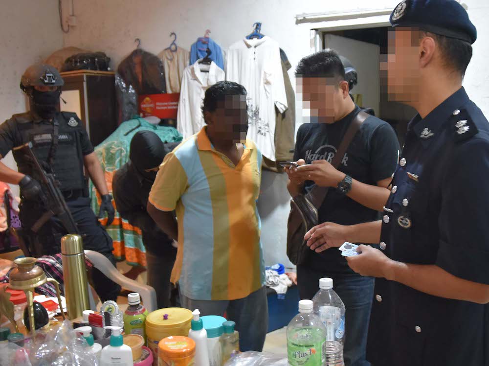Counter-terrorism police carry out an operation against suspected Liberation Tigers of Tamil Eelam (LTTE) sympathisers in Sungai Buloh October 10, 2019. — Picture courtesy of PDRM