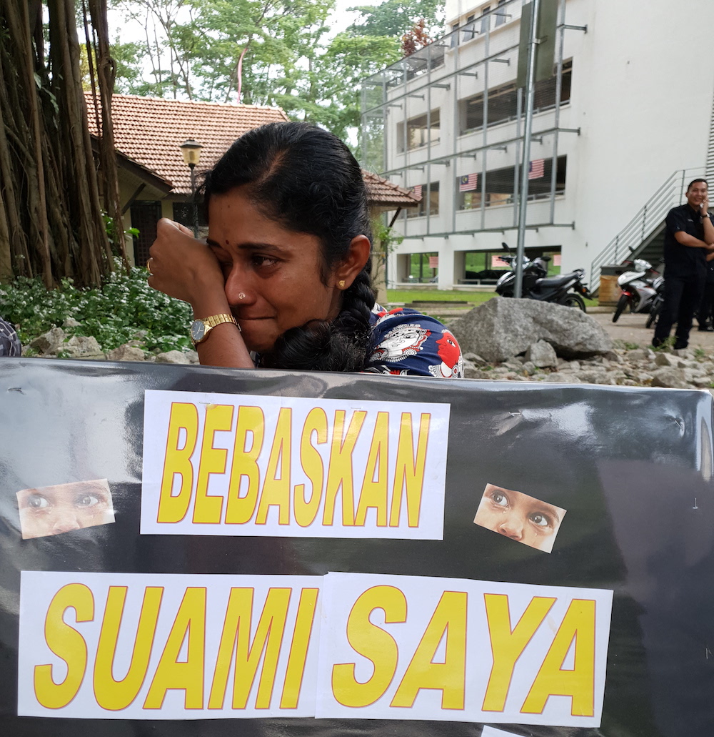 Wife of Gadek assemblyman G. Saminathan, Umah Devi, cries as she talks to Malay Mail outside the Bukit Aman police headquarters in Kuala Lumpur October 24, 2019. u00e2u20acu201d Picture by Soo Wern Jun