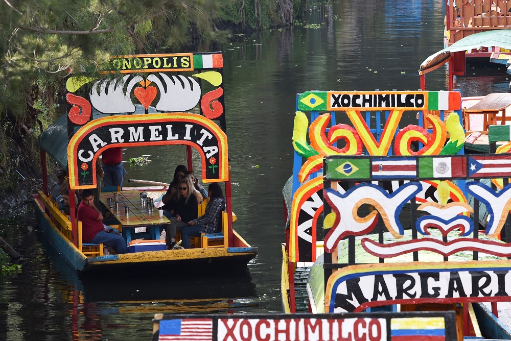 Visitors aboard ‘trajineras’ sail in Xochimilco, Mexico City October 5, 2019. ― AFP pic 