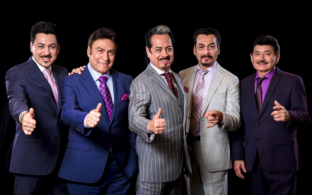 From left: Luis Hernandez, Jorge Hernandez, Hernan Hernandez, Eduardo Hernandez and Oscar Lara, members of the Mexican music group Los Tigres del Norte, pose for pictures after an interview with AFP in Mexico City October 14, 2019. u00e2u20acu201d AFP pic  