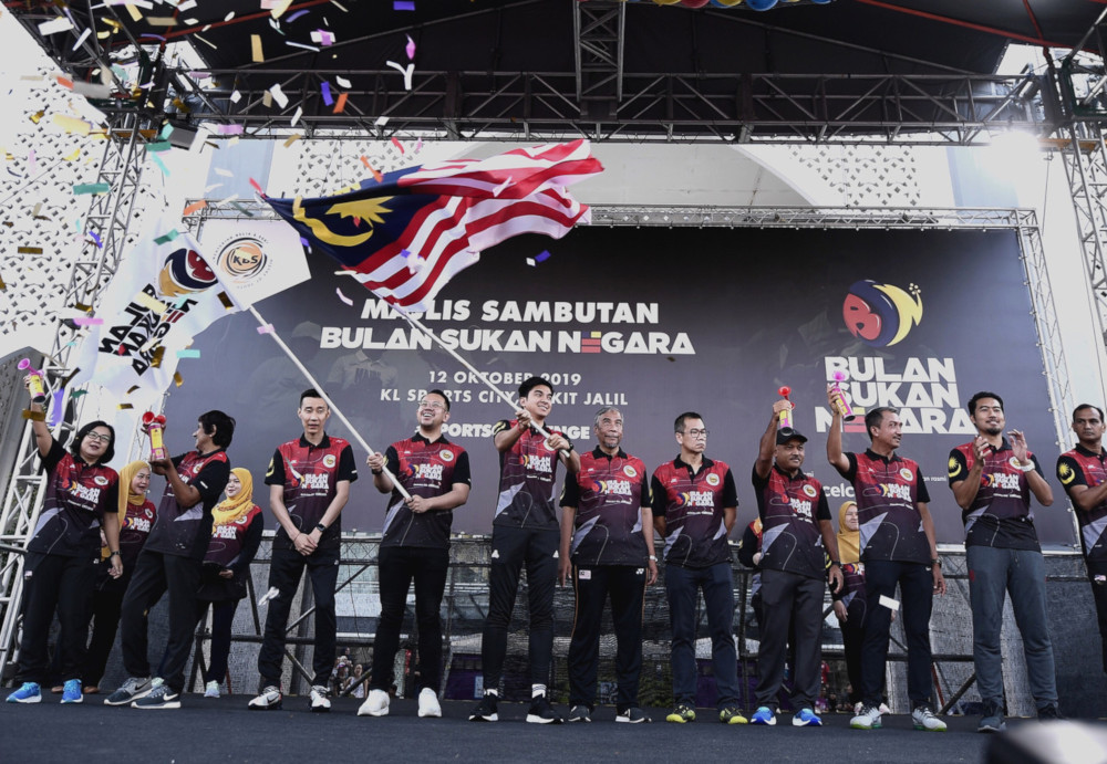 Youth and Sports Minister Syed Saddiq Syed Abdul Rahman, his deputy Steven Sim Chee Keong (4th left) during the launch of National Sports Day at the Bukit Jalil National Stadium October 12, 2019. u00e2u20acu201d Bernama pic   