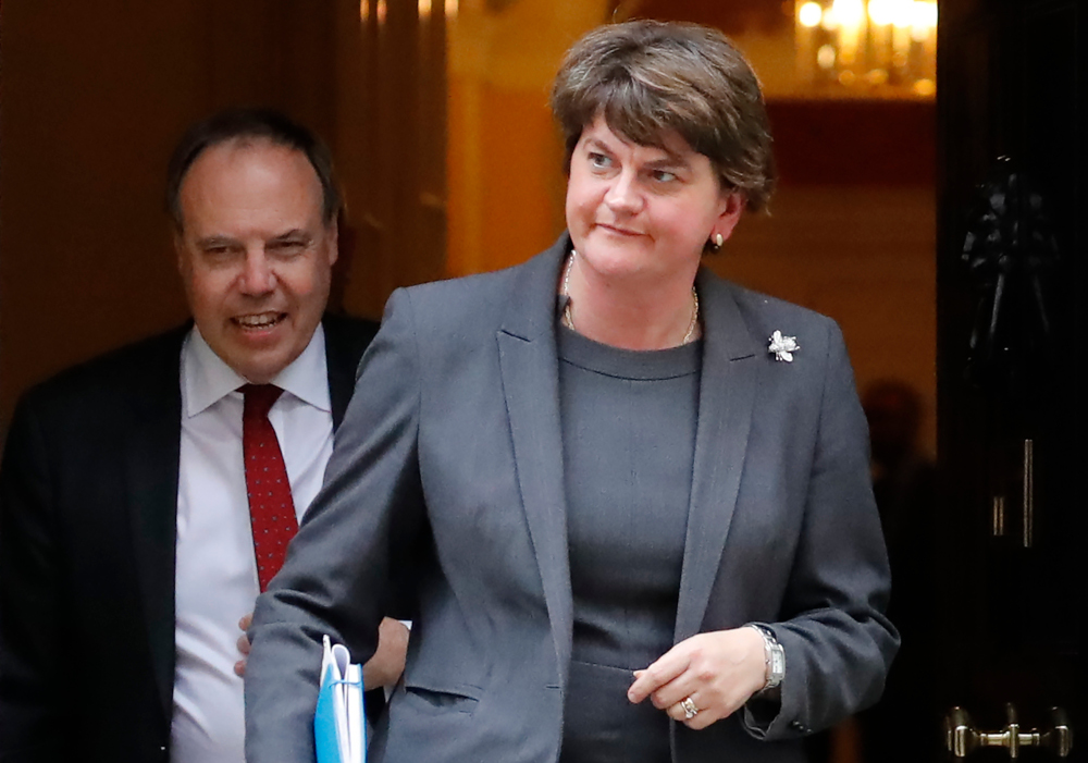 In this file photo taken September 10, 2019 N. Irelandu00e2u20acu2122s DUP leader Arlene Foster and deputy Nigel Dodds leave from 10 Downing Street in central London. u00e2u20acu201d AFP pic 