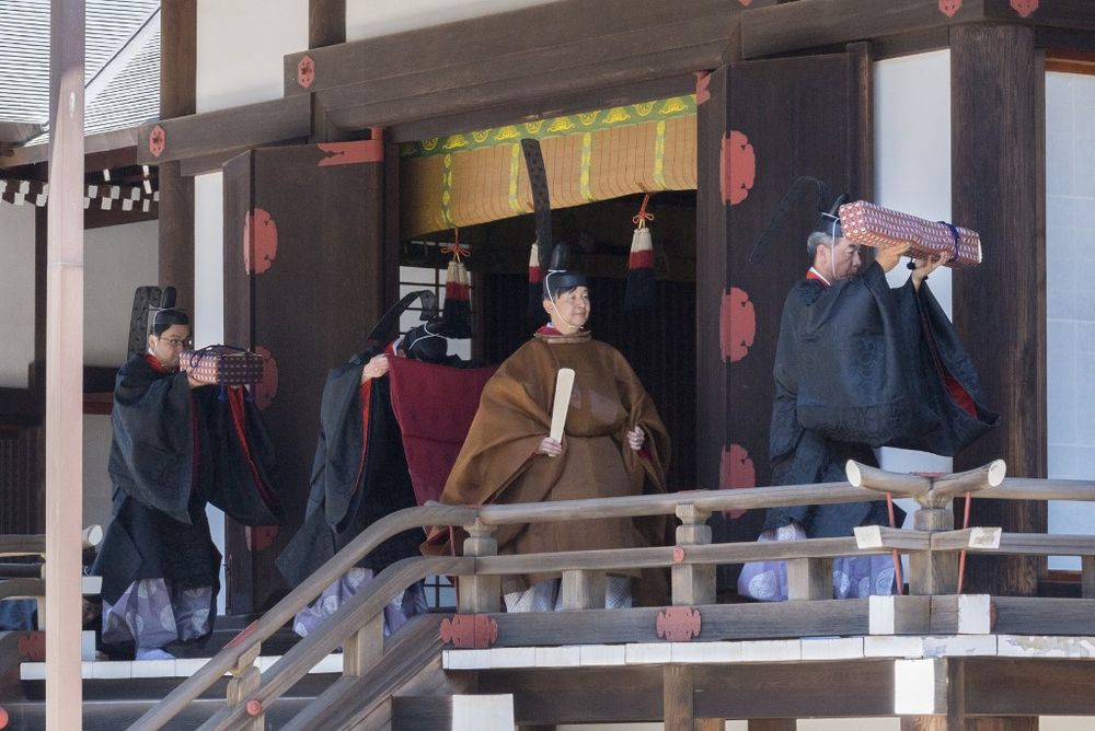 File picture shows Japanu00e2u20acu2122s new Emperor Naruhito walking for a ritual at the Imperial Sanctuaries, at the Imperial Palace in Tokyo, May 8, 2019. u00e2u20acu201dHandout /Imperial Household Agency/AFP pic
