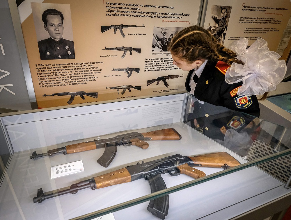 A military cadet girl looks at rifles at the opening of the exhibition entitled ‘Kalashnikov, a soldier, a designer, a legend’ dedicated to the 100th anniversary of the birth of Mikhail Kalashnikov, the Russian inventor of the AK-47 assault rifle, at the Victory Museum in Moscow on September 24, 2019. — AFP pic