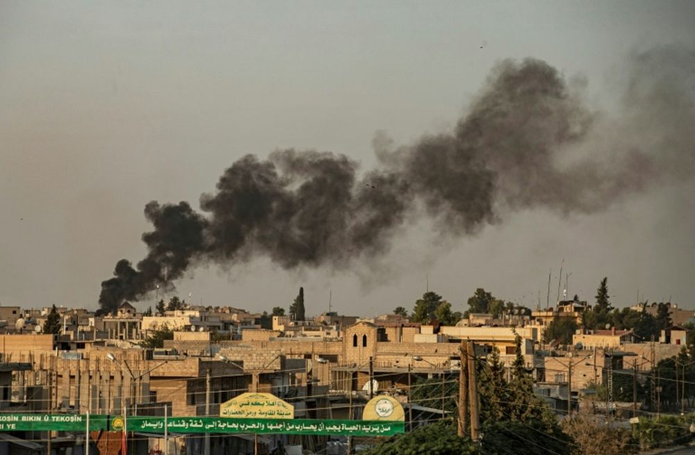 Smoke billows into the air following Turkish bombardment on Syriau00e2u20acu2122s north-eastern Kurdish-held town of Ras al-Ain on October 9, 2019. u00e2u20acu201d AFP pic