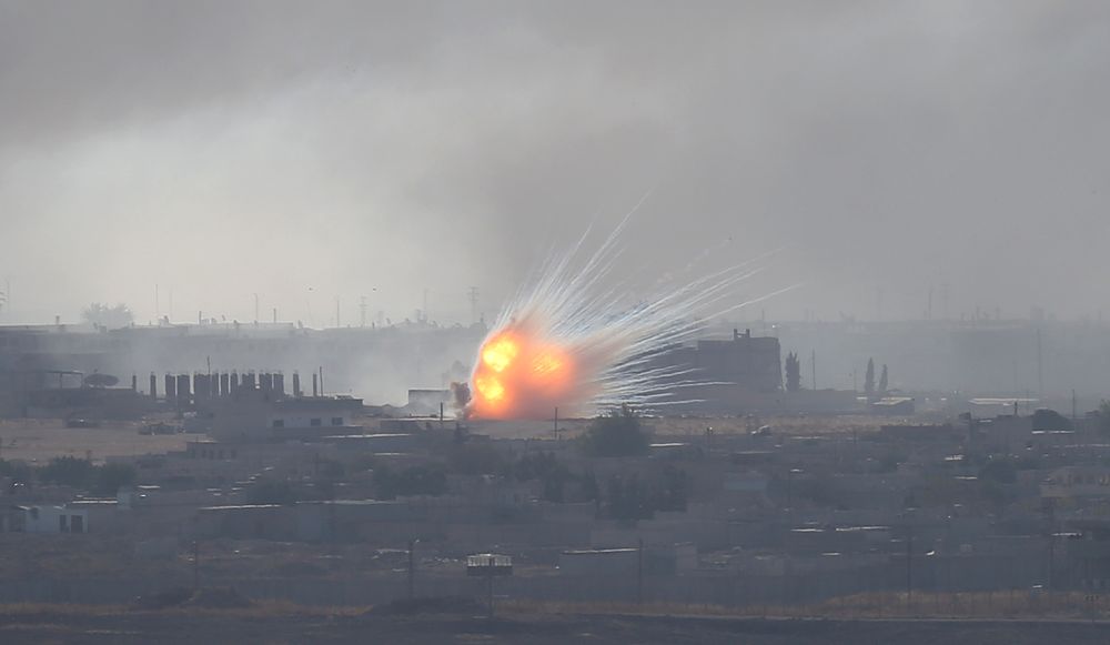 An explosion is seen over the Syrian town of Ras al-Ain as seen from the Turkish border town of Ceylanpinar, Sanliurfa province, Turkey, October 12, 2019. u00e2u20acu201d Reuters pic
