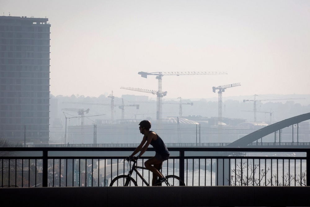 A man rides a bicycle on one of Belgradeu00e2u20acu2122s bridges on October 27, 2019. u00e2u20acu201d AFP pic  