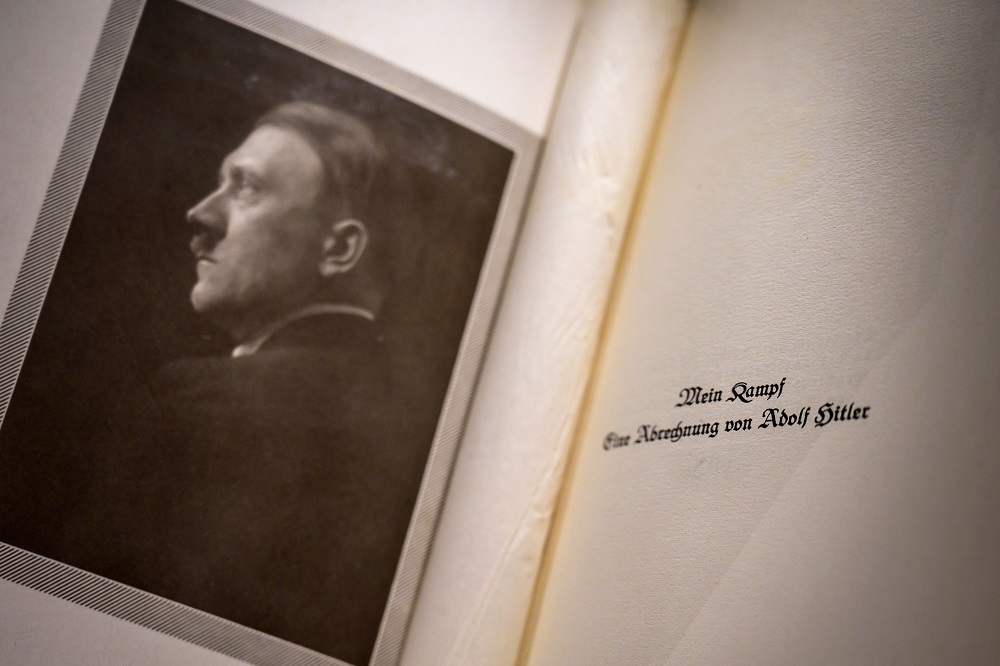 An autographed original edition of Adolf Hitleru00e2u20acu2122s u00e2u20acu02dcMein Kampfu00e2u20acu2122 book is displayed at the Martin Bodmer Foundation during the u00e2u20acu02dcWar and Peaceu00e2u20acu2122 exhibition in Cologny near Geneva October 11, 2019. u00e2u20acu201d AFP pic     