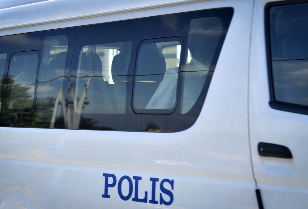DAP lawmakers P. Gunasekaran and G. Saminathan, along with S. Chandru, are ferried to the Melaka Sessions Court in Ayer Keroh October 29, 2019. u00e2u20acu201d Bernama pic