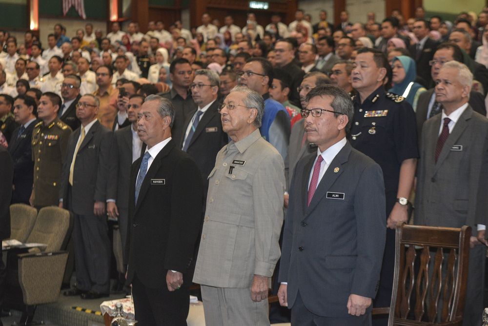 Tun Dr Mahathir Mohamad (centre) attends the launch of the Security and Public Order Policy at the Home Ministry in Putrajaya October 3, 2019. u00e2u20acu201d Picture by Shafwan Zaidon