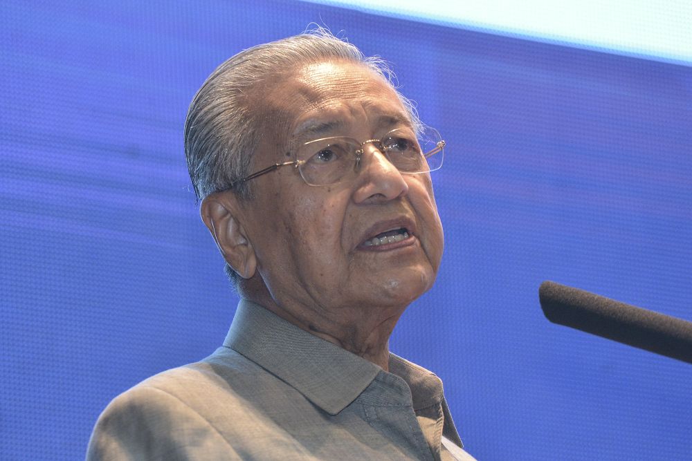 Tun Dr Mahathir Mohamad speaks during the launch of the Security and Public Order Policy at the Home Ministry in Putrajaya October 3, 2019. u00e2u20acu201d Picture by Shafwan Zaidon