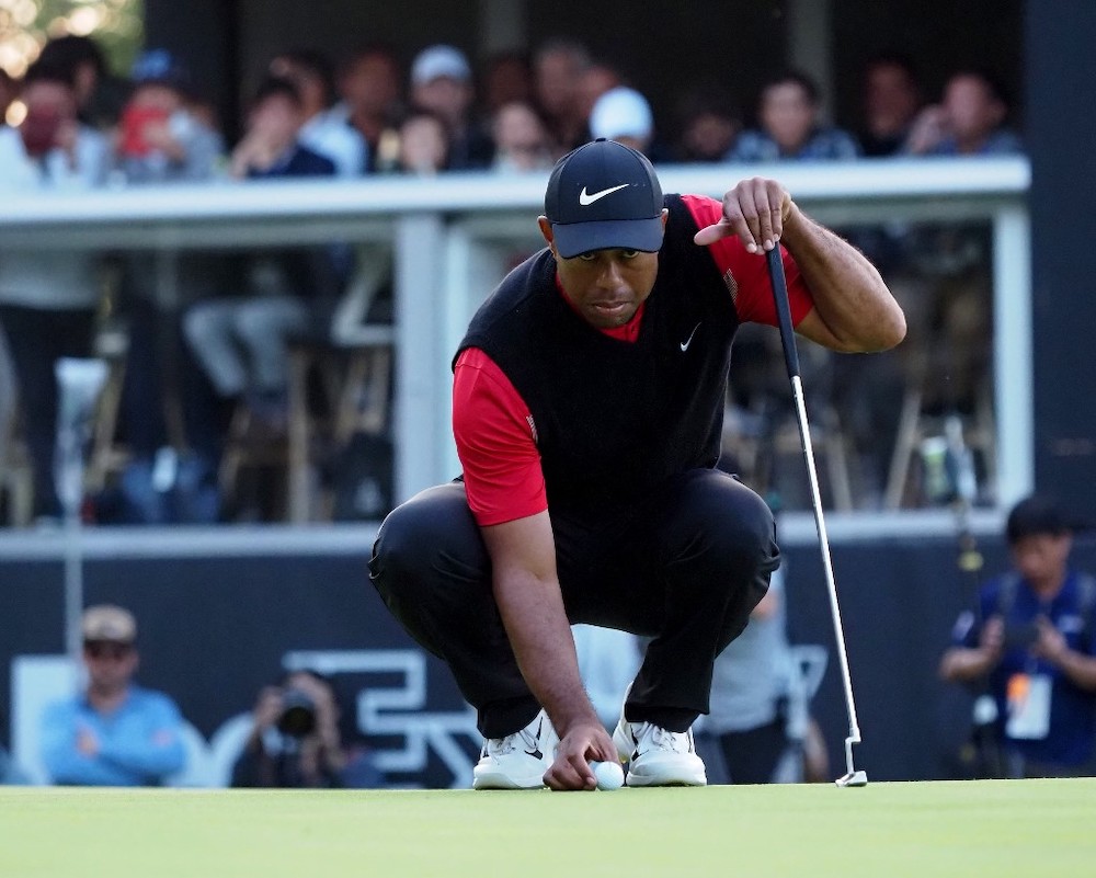 Tiger Woods of the US checks the line on the 9th hole green during the fourth round of the PGA Zozo Championship golf tournament at the Narashino Country Club in Inzai, Chiba prefecture on October 27, 2019. u00e2u20acu201d AFP pic
