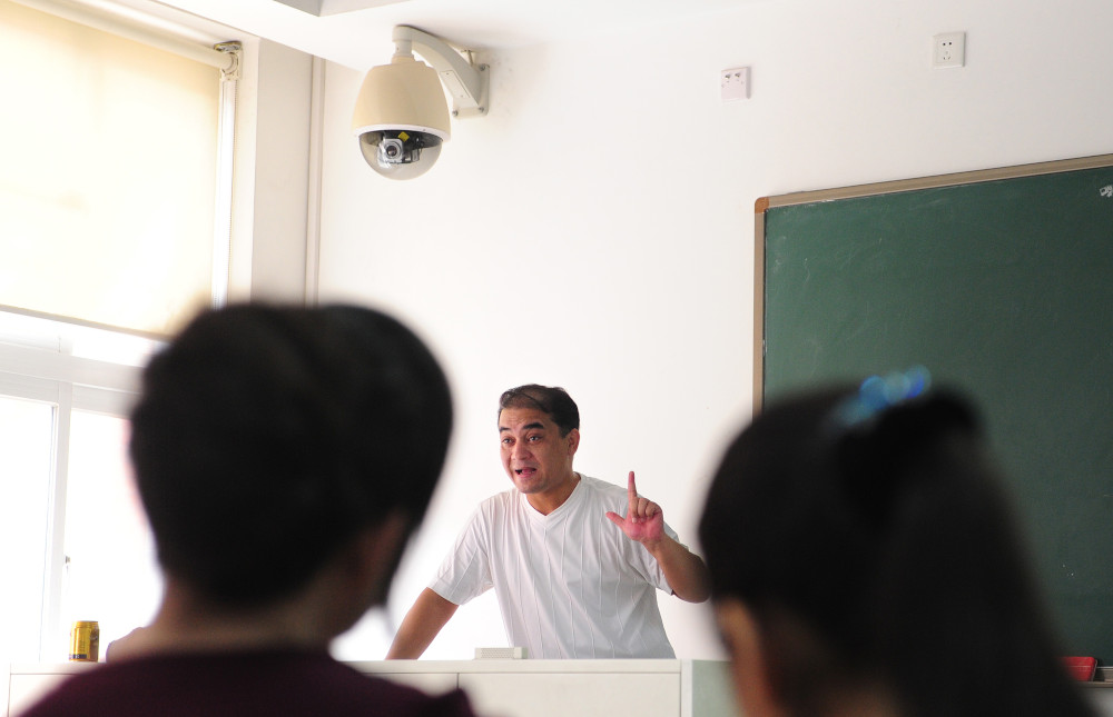 University professor, blogger and member of the Muslim Uighur minority Ilham Tohti lectures in a classroom in Beijing in this file picture taken June 12, 2010. u00e2u20acu201d AFP pic