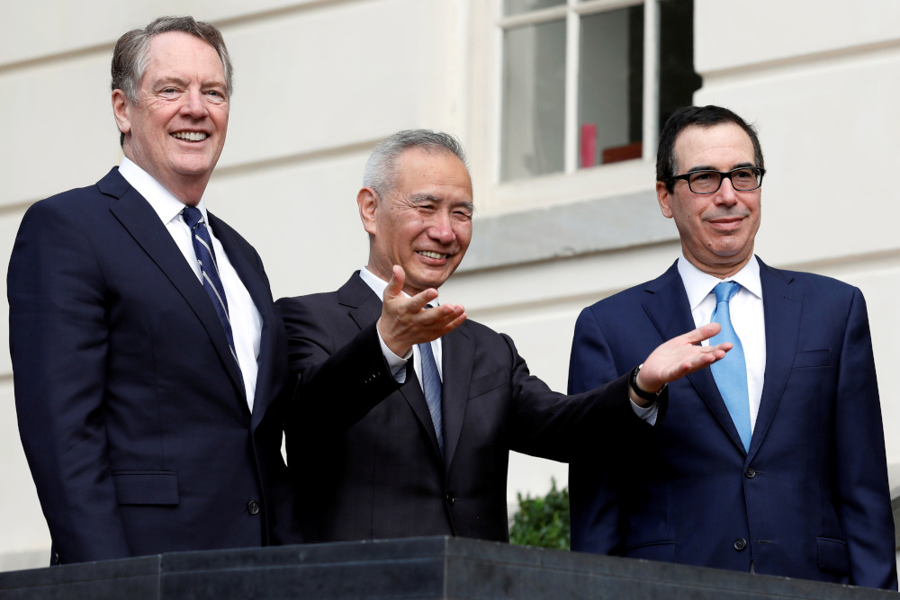 Chinau00e2u20acu2122s Vice Premier Liu He gestures to the media between US Trade Representative Robert Lighthizer (left) and Treasury Secretary Steve Mnuchin before the two countries' trade negotiations in Washington, October 10, 2019. u00e2u20acu201d Reuters pic 