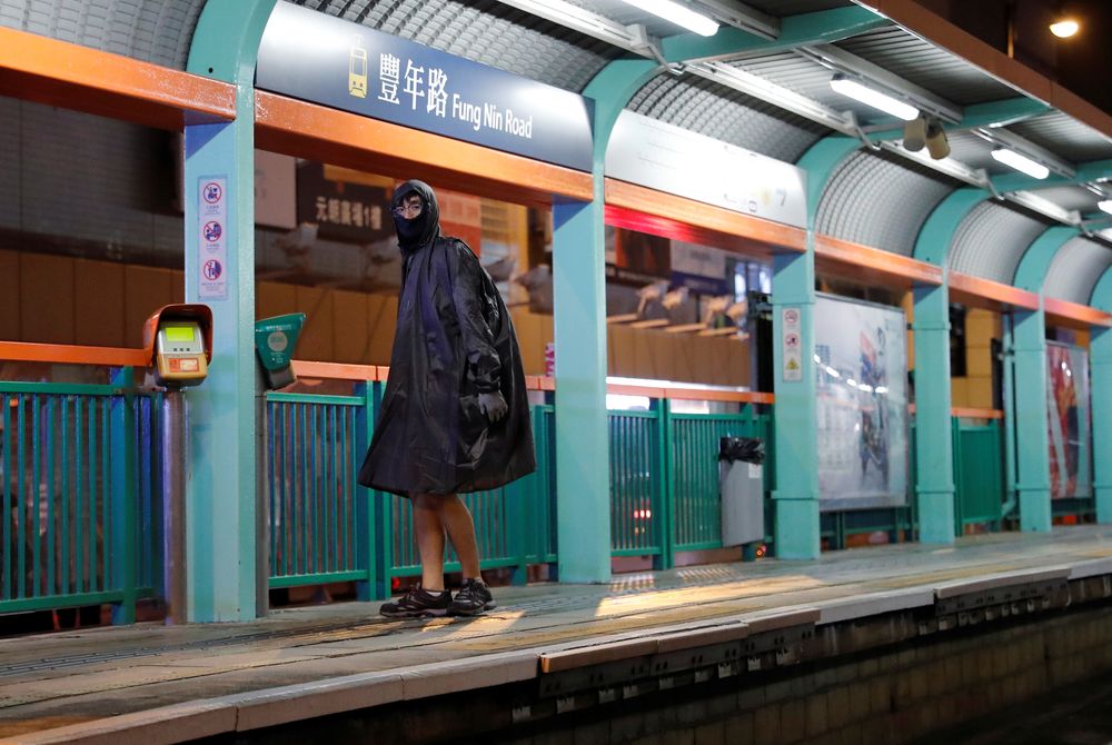 An anti-government protester wears a raining coat with half his face covered during a demonstration after a governmentu00e2u20acu2122s ban on face masks under emergency law, at Yuen Long, in Hong Kong, China, October 5, 2019. u00e2u20acu201dReuters pic
