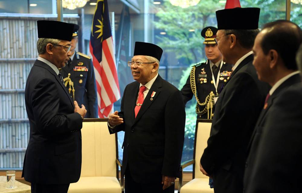 Yang di-Pertuan Agong Al-Sultan Abdullah Riu00e2u20acu2122ayatuddin Al-Mustafa Billah Shah greets Indonesian vice-president Mau00e2u20acu2122ruf Amin at a hotel in Tokyo October 22, 2019. u00e2u20acu2022 Bernama pic