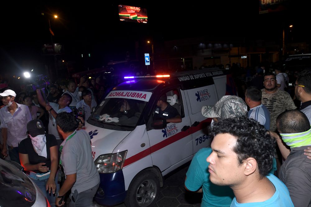 People gather around an ambulance carrying the body of Marcelo Terrazas, a protester who was killed during clashes, in Montero in Santa Cruz, Bolivia, October 31, 2019. u00e2u20acu201d Reuters pic